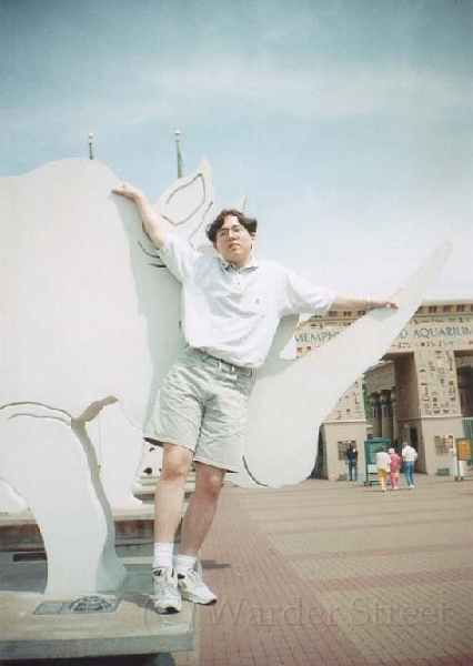 Brad With Rhino Statue.jpg